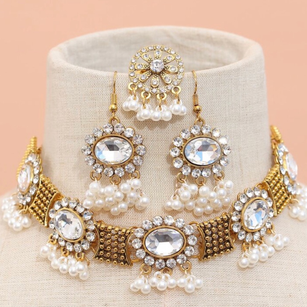 Matching necklace with earrings and ring